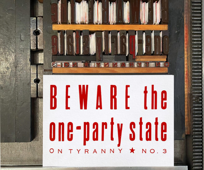 Letterpress print on Vandercook press bed. Printed in red ink on white paper, the text reads "Beware the One Party State On Tyranny No. 3."