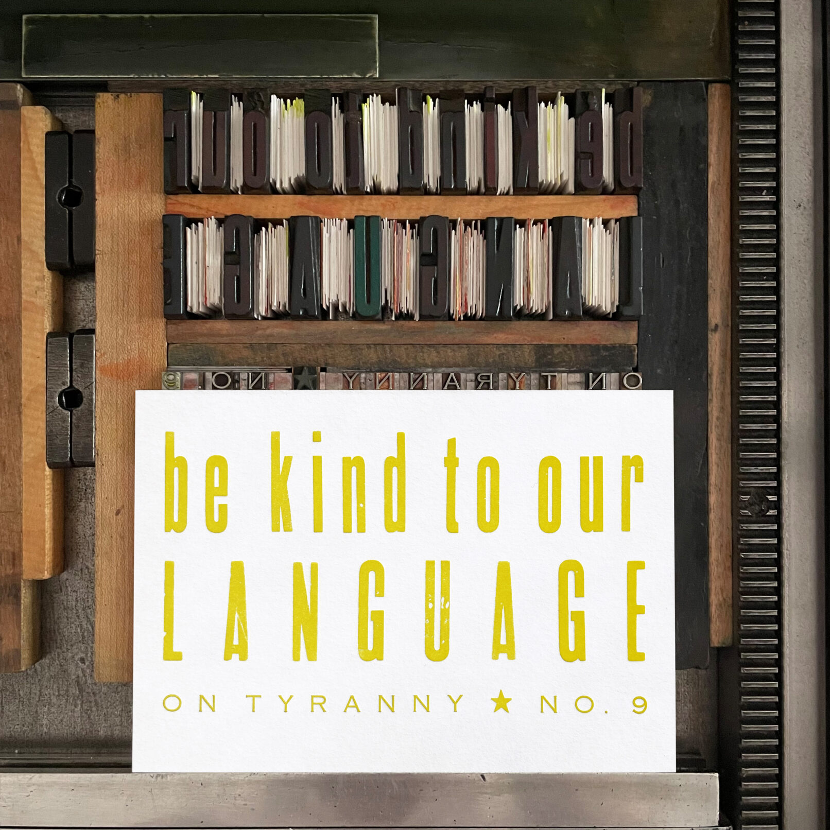 Letterpress print on Vandercook press bed. Printed in chartreuse ink on white paper, the text reads "Be Kind To Our Language On Tyranny No. 9."