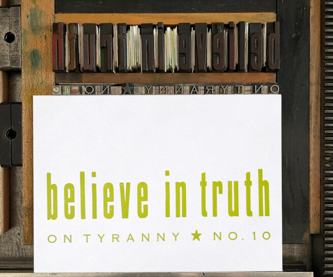 Letterpress print on Vandercook press bed. Printed in yellow-green ink on white paper, the text reads "Believe in Truth On Tyranny No. 10."